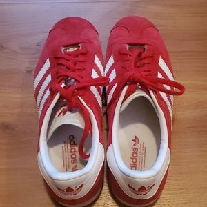 Red suede Adidas Gazelle Sneakers